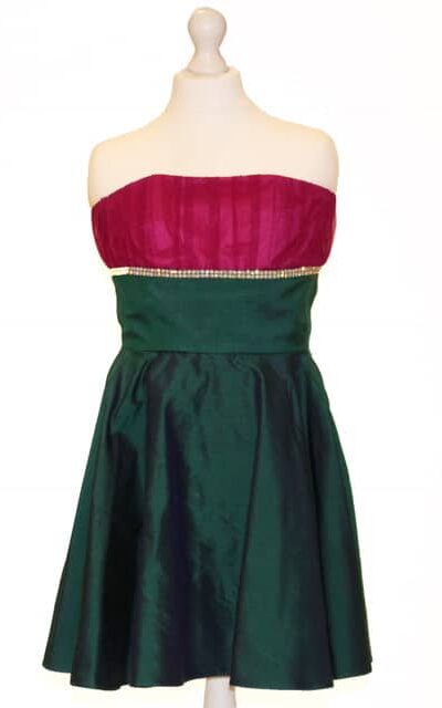 Love Story Strapless Taffeta dress. Taffeta dress with tulle ruched strapless bodice in a stunning fuschia with diamante detail with a midnight green taffeta skater body and skirt from Silhouette London, Girls Dress specialist in London