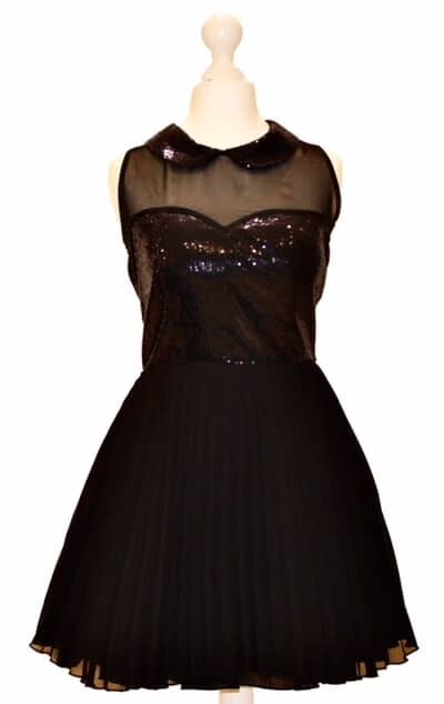 'Pre-Loved' Jones and Jones Skater Dress in Black. Jones and Jones chiffon short pleated skater dress with sequin and chiffon bodice from Silhouette London, Specialist Dress Boutique in London