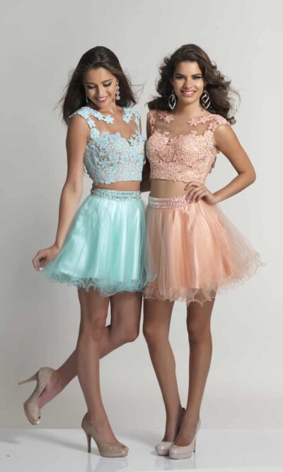 Young ladies wearing a Dave and Johnny Dress Style 784 in Blush. Two piece with embellished lace top with back detail and gorgeous tulle skater style skirt from Silhouette London, Girls party dress specialists in London.