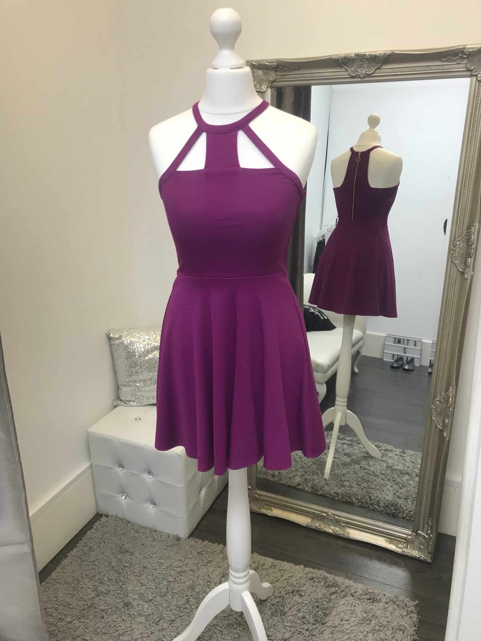 Sally Miller Naomi Dress 1 Sally Miller Naomi Dress in Orchid. Quality heavy jersey skater dress in a stunning orchid colour with a fabulous keyhole halter neck and back design with zip fastening from Silhouette London, Girls party dress specialists in London