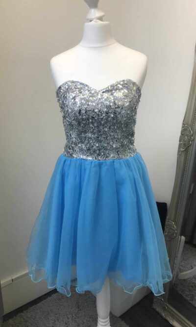 AB Crystal and Tulle Dress in turquoise. Irridescent crystals adorn this sweetheart bodice with corset closing and full turquoise tulle skirt with scalloped edge from Silhouette London, Girls party dress specialists in London