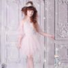 Ooh la la Couture Land of Sweets Dress 3 Young Girl wearing Ooh la la Couture Land of Sweets Dress in Blush Pink tulle and beaded jersey from Silhouette London, a Girls Prom and Party Dress Specialist Boutique in Greater London