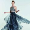 Tiffany Illusion Prom Trinity Two Piece Dress 4 Teenage model wearing a Tiffany Illusion Prom Trinity Two Piece Dress in Charcoal. Fabulous two piece with crystal encrusted halter neck bodice and wonderfully full long tiered tulle skirt with banded edges from Prom Dress Boutique Silhouette London