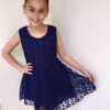 Dress - Style TIA229 in Navy 3 Young girl wearing fully lined embroidered chiffon style skater dress with fabulous keyhole back detail from Silhouette London a Girls Party Fashion Boutique in Harrow.