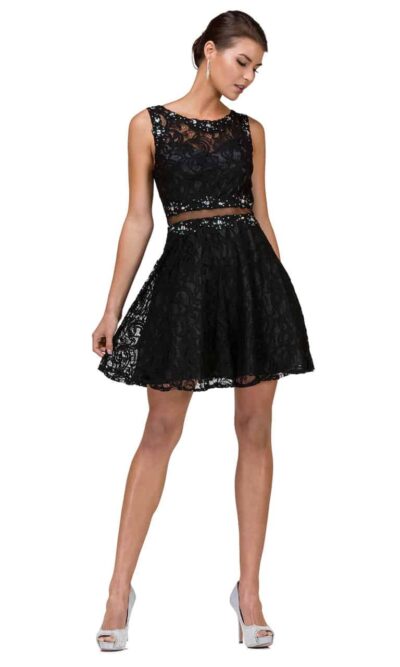 Young woman wearing Dancing Queen Dress Style 2053 in black. Lace with crystal embellishment and mesh detail to give the illusion of a two piece with a skater skirt. From Silhouette London a Teen Prom and Party Boutique in Greater London.