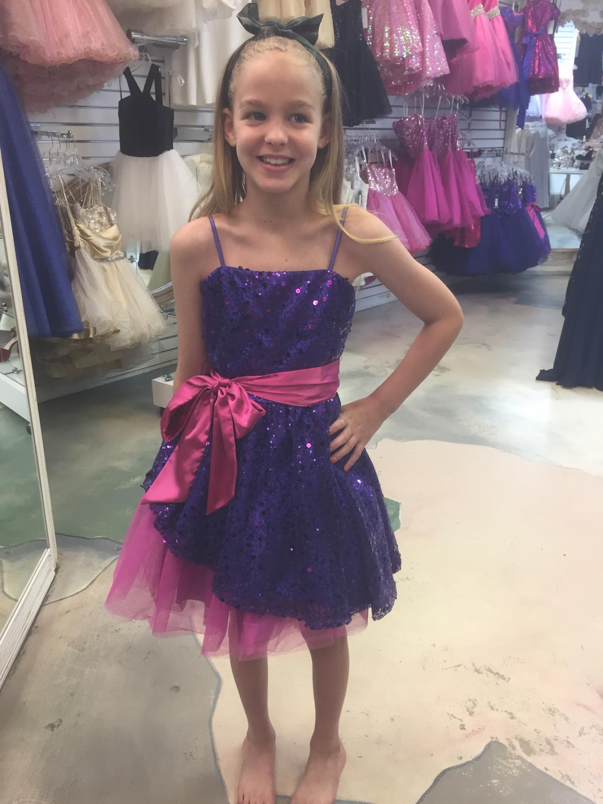 Pre-Loved Un Deux Trois Purple Sequin Peekaboo Dress 1 Pre-Loved Un Deux Trois Purple Sequin Peekaboo Dress with Fuschia Satin Belt and Tulle Skirt