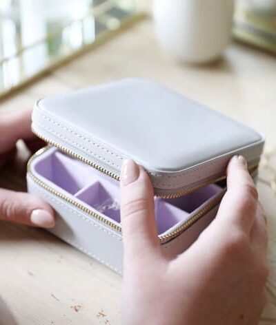 Square Travel Jewellery Box in Grey and Purple available from Silhouette London