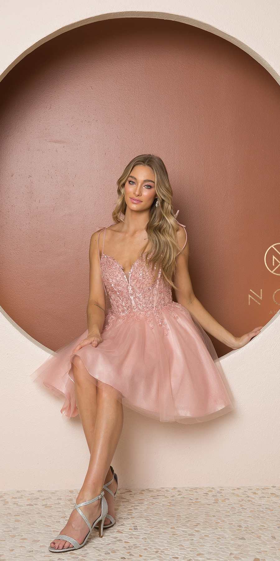 Nox Anabel Dress Style F732 3 Nox Anabel Short Prom Dress Style F732 in Blush Pink sitting