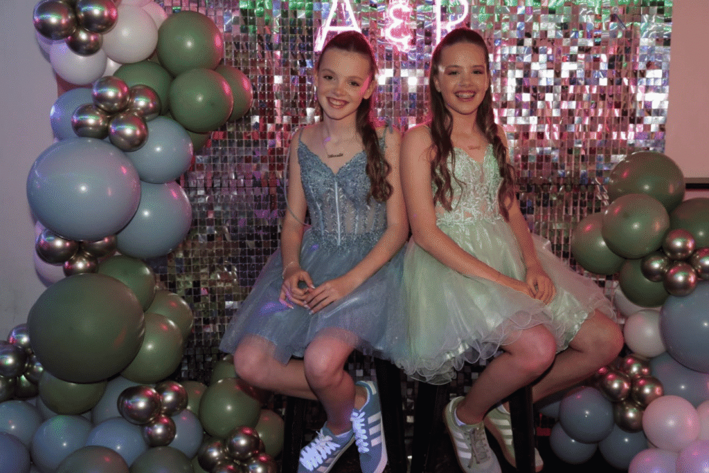 Twin Batmitzvah Girls in Steel Blue and Sage Green Party Dresses