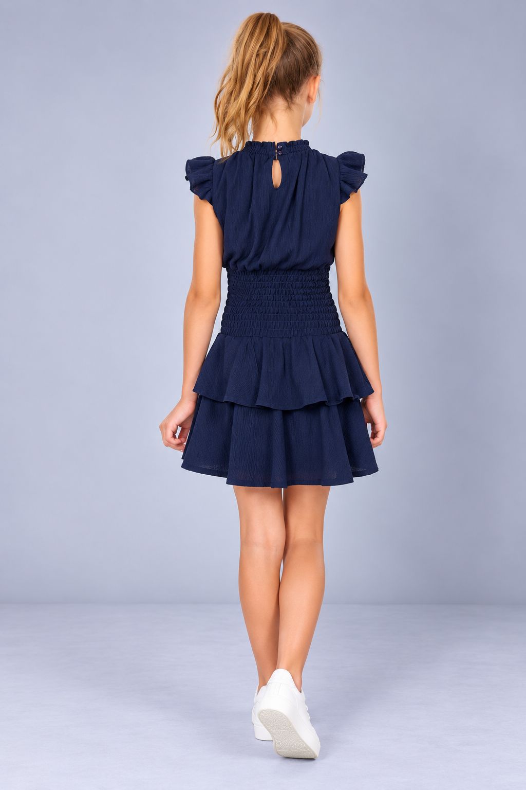 Ava & Yelly Smocked Ruffle Dress Navy 2 Ava & Yelly Smocked Ruffle Dress in Navy on Model Back
