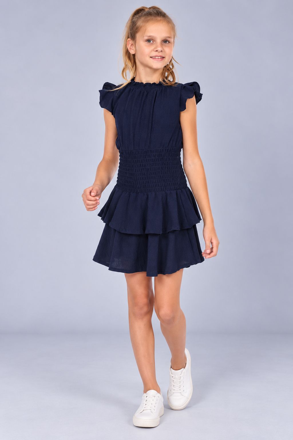 Ava & Yelly Smocked Ruffle Dress Navy 1 Ava & Yelly Smocked Ruffle Dress in Navy on Model